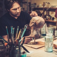 Man working in a prosthetic special fx workshop